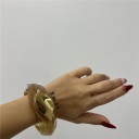 bracciale con dettaglio oro sul davanti shine